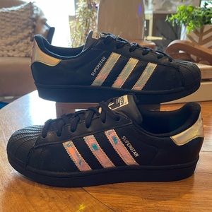Men’s size 5.5 black holographic striped Adidas Superstar sneakers